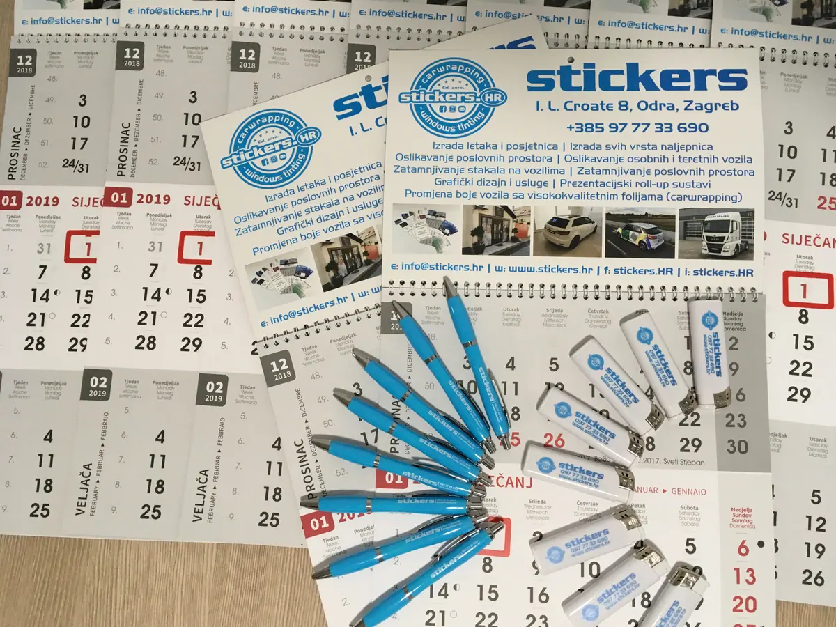 Promotivni materijal Stickers.hr: zidni kalendari, olovke i upaljači s logotipom